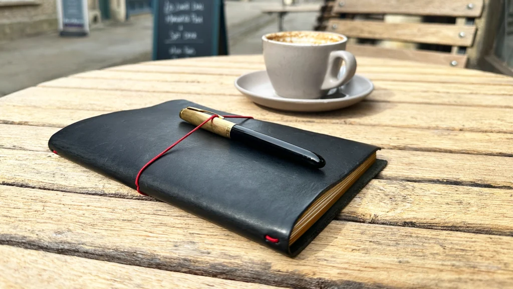 journal on a coffee table